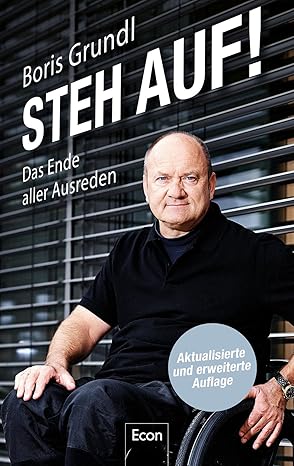 Boris Grundl, Autor von „Steh Auf!“, sitzt im Rollstuhl. Aktualisierte Ausgabe.